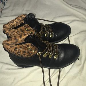 Black lace up ankle boots with leopard design
